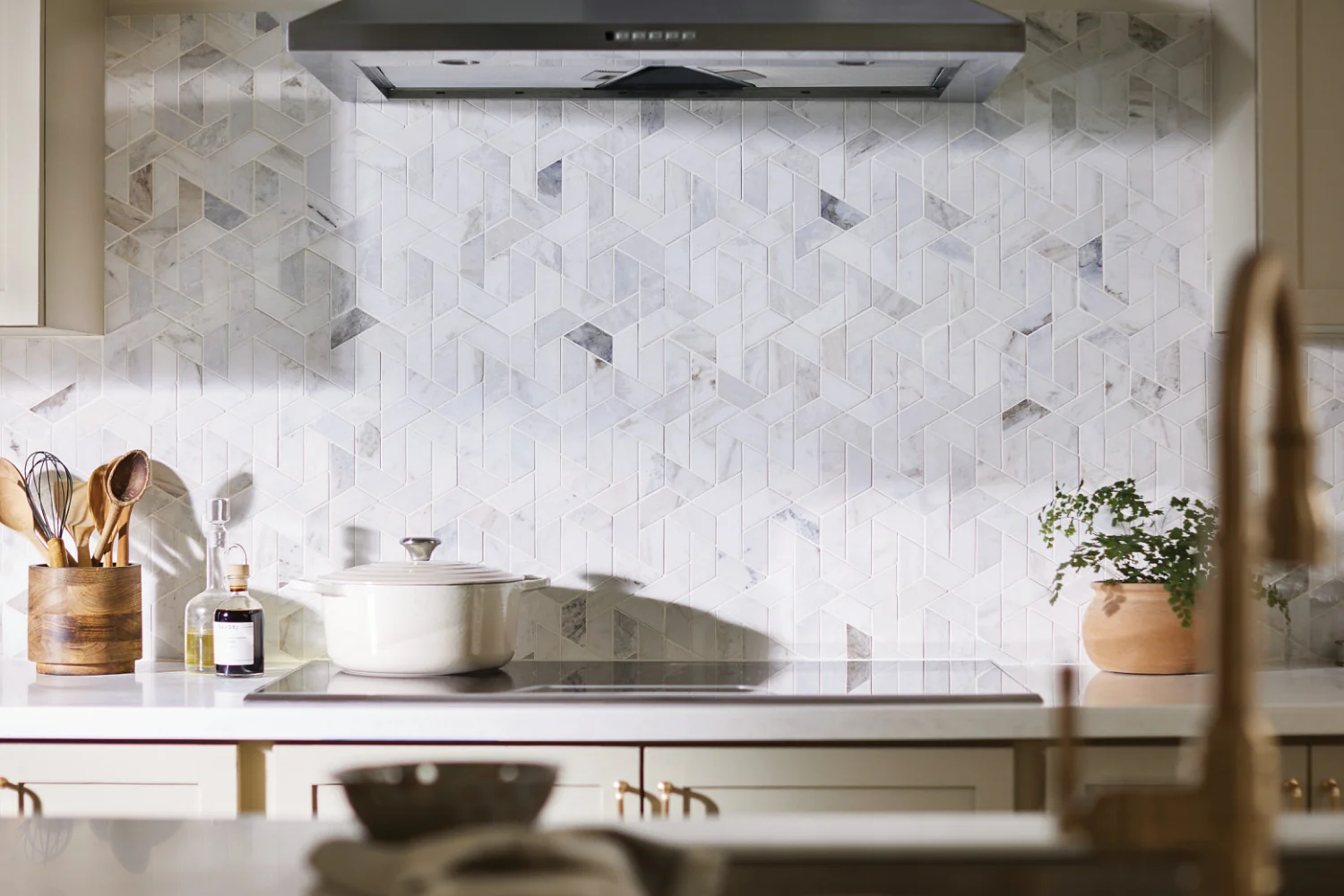 Shaw geometric tile backsplash in a contemporary kitchen